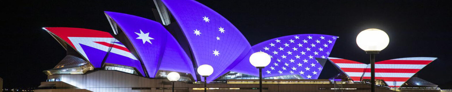 Its a Sydney opera house. Displaying Australian flag on it.